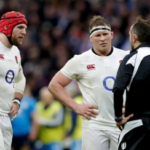 Dylan Hartley (C) discusses Italy's tactics with referee Romain Poite on Sunday CREDIT: REUTERS